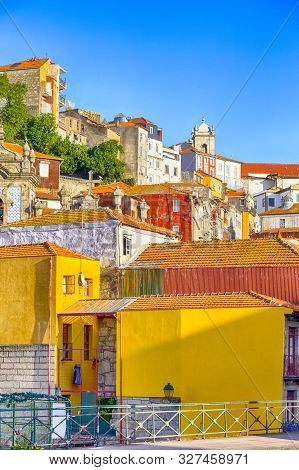 Travel Concepts. Colorful Walls And Roofs Of Porto City In Portugal. Vertical Image