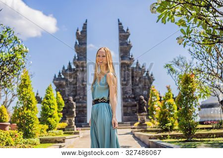 Young Woman Tourist In Budhist Temple Brahma Vihara Arama Banjar Bali, Indonesia