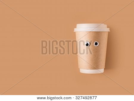 Funny Googly Eyes  Cup Of Coffee To Go Paper Flat Lay On Brown Background, Creative Concept, Copy Sp