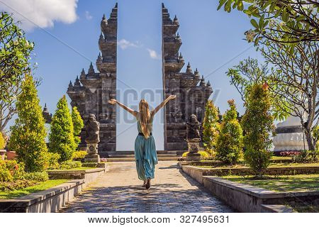 Young Woman Tourist In Budhist Temple Brahma Vihara Arama Banjar Bali, Indonesia