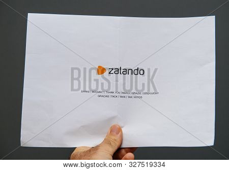 Paris, France - Sep 13, 2019: Man Hand Holding Zalando Thank You Letter With Logotype Of The On-line