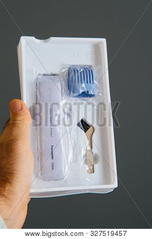 Paris, France - Sep 13, 2019: Man Hand Holding Women Panasonic Es246 Bikini Shaper And Trimmer Devic