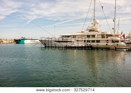 Denia, Valenciana, Spain - Sept 23 2019 : Streets Of Denia With Tourists Wandering Around.