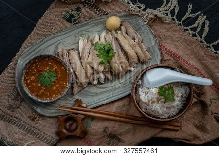 Asian Food Style Marinated Steamed Chicken (betong Chickken) With Rice And Sauce On Ceramic Plate. T