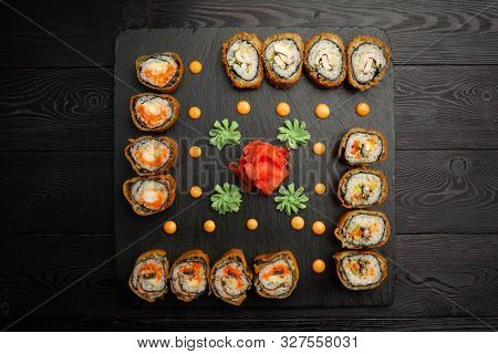 Hotto Set Of Sushi Rolls On Black Stone