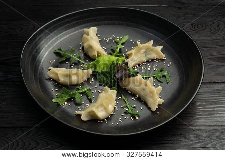 Gedza Syumai Steamed Chinese Dumplings With Shrimp And Vegetables, Served With Sauce