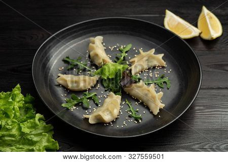 Gedza Syumai Steamed Chinese Dumplings With Shrimp And Vegetables, Served With Sauce