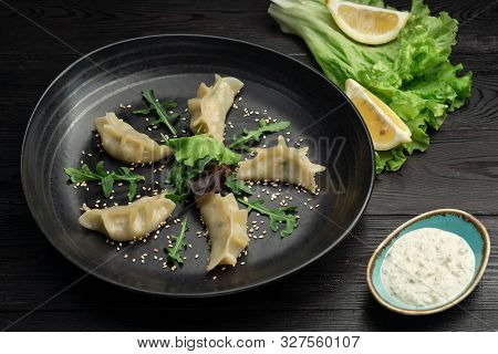Gedza Syumai Steamed Chinese Dumplings With Shrimp And Vegetables, Served With Sauce
