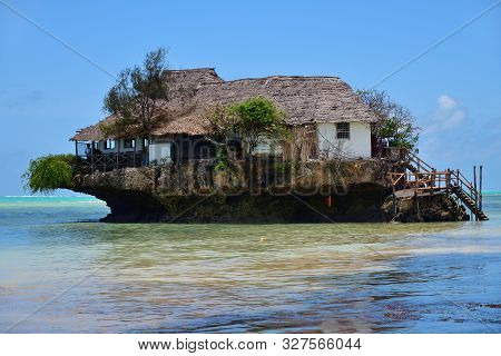 Pingwe, Zanzibar - October 6, 2019: The Rock Restaurant. It Is World-famous Restaurant Known For Its