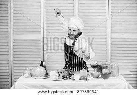 Chef Hold Cleaver Knife Tool Ready To Chop Ingredients. Man Wear Apron Cooking In Kitchen. Man Use S