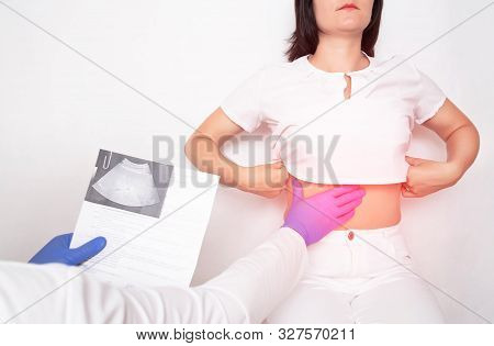 The Doctor Examines A Girl Patient With Fatty Hepatosis And Metabolic Disorders In The Liver, Cirrho