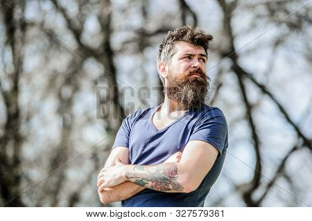 Man Attractive Bearded Hipster Posing Outdoors. Confident Posture Of Handsome Man. Guy Masculine App