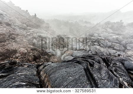 Volcanic Foggy Landscape With Solidified Lava. Solid Lava Near Active Volcano Tolbachik, Kamchatka P