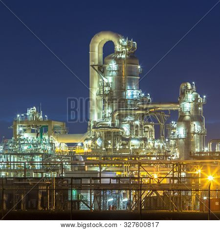 Detail Of Illuminated Petrochemical Industry In Darkness On Maasvlakte Area Port Of Rotterdam, The N