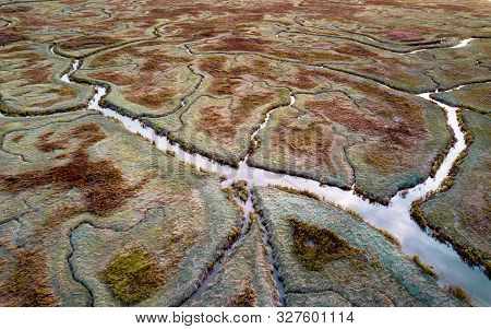 Aerial View Of Tidal Marshland With Natural Meandering Drainage System In Verdronken Land Van Saefti