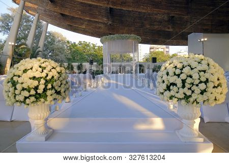 Beautiful Photo Of The Jewish Hupa , Wedding Putdoor .two Glasses And Bottle Of Wine And Glass It Is
