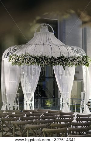 Beautiful Photo Of The Jewish Hupa , Wedding Putdoor .two Glasses And Bottle Of Wine And Glass It Is