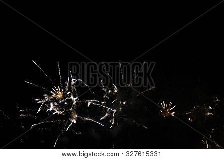 The Celebration Colored Firework Flashing In The Black Night Sky Background