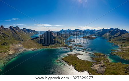 Fredvang Bridges Panorama. Lofoten islands is an archipelago in the county of Nordland, Norway. Is known for a distinctive scenery with dramatic mountains and peaks, open sea and sheltered bays.