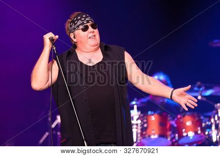 HUNTINGTON - OCT 10: Mike Reno of Loverboy performs in concert at the Paramount on October 10, 2019 in Huntington, New York.