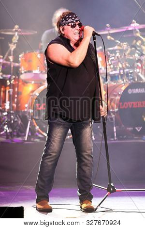 HUNTINGTON - OCT 10: Mike Reno of Loverboy performs in concert at the Paramount on October 10, 2019 in Huntington, New York.