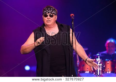 HUNTINGTON - OCT 10: Mike Reno of Loverboy performs in concert at the Paramount on October 10, 2019 in Huntington, New York.