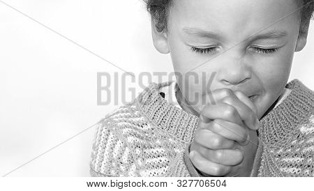 Boy Praying To God Stock Image With Hands Held Together With Closed Eyes  Stock Photo