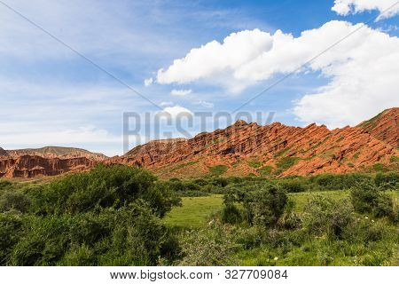 Seven Bulls Jeti Ogyz Valley Red Sandstone Formation In Kyrgyzstan