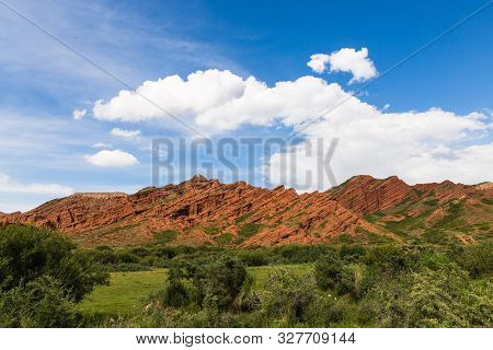 Seven Bulls Jeti Ogyz Valley Red Sandstone Formation In Kyrgyzstan