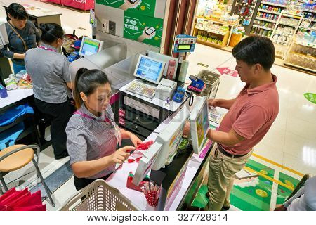 SHENZHEN, CHINA - CIRCA APRIL, 2019: checkout counters at JUSCO store in Shenzhen.