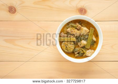 Pork Curry With Thai Morning Glory With Red Curry In White Bowl On Wooden Background. Thai Food.
