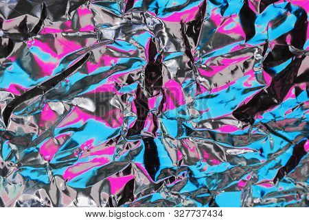 Crumpled Foil Colorful Backdrop. Abstract Texture Background.