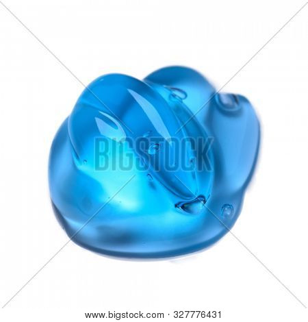 Squeezed cosmetic clear cream gel texture Iisolated on white background. Close up photo of transparent drop of skin care product. High Quality transparent gel with bubbles closeup on white background