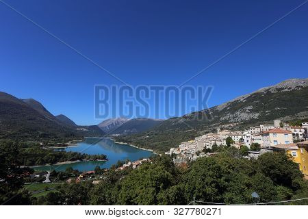 Barrea, Italy - 12 October 2019: Lake Barrea And The Mountain Village