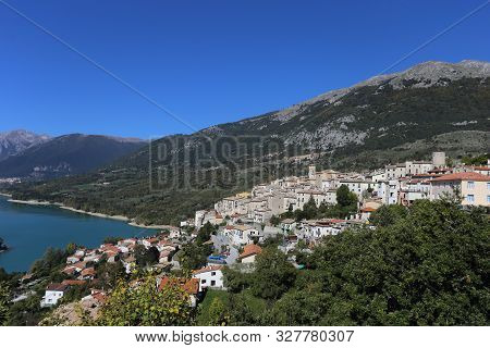 Barrea, Italy - 12 October 2019: Lake Barrea And The Mountain Village