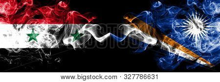 Syria Vs Marshall Islands Smoke Flags Placed Side By Side. Thick Colored Silky Smoke Flags Of Syrian
