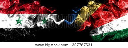 Syria Vs Seychelles, Seychelloise Smoke Flags Placed Side By Side. Thick Colored Silky Smoke Flags O