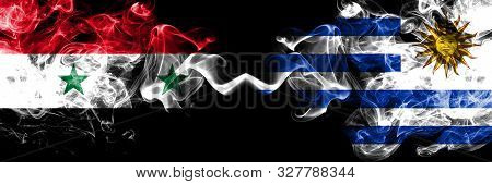 Syria Vs Uruguay, Uruguayan Smoke Flags Placed Side By Side. Thick Colored Silky Smoke Flags Of Syri