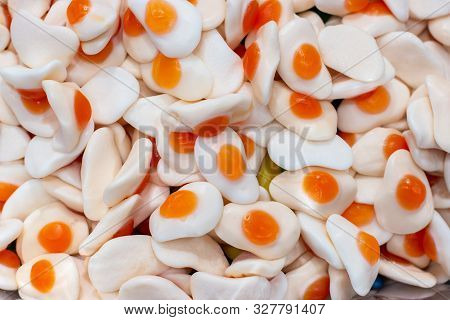 Sweet Marmalade In The Shape Of Fried Eggs, Close-up Background Wallpaper Food. Jelly Candy White Ye