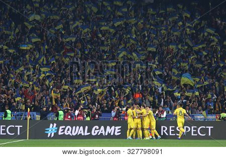 Kyiv, Ukraine - October 14, 2019: Ukrainian Players Celebrate After Roman Yaremchuk Scored A Goal Du