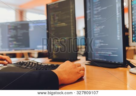 Programmer Hand Faster Typing On Keyboard. Programmer Coding Program And Website Put On Wood Table W