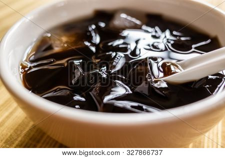 traditional Taiwanese snacks of mesona black herbal tea in a bowl