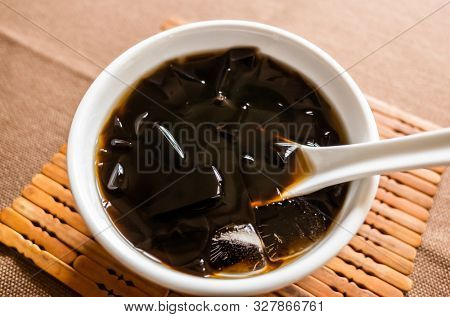 traditional Taiwanese snacks of mesona black herbal tea in a bowl