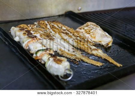 Seafood On The Grill, Sole Fish And Skewer With Peppers Tomatoes And Crab