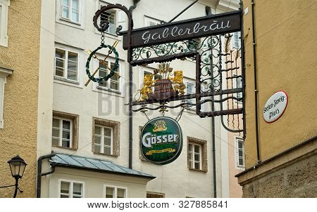 Salzburg, Austria - May 26, 2019: The Ornate Sign For The Gablerbräu Restaurant Hangs Above The Stef