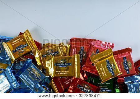 October 14 2019 Ny Usa: Collection Of Small Ghirardelli Squares Milk Chocolate Caramel Candy Company