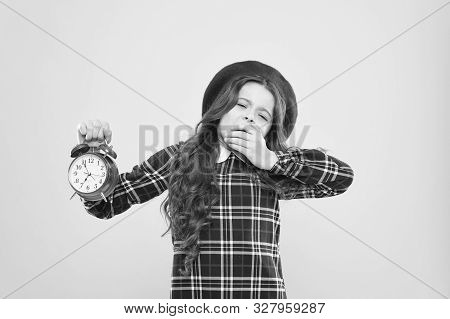 Its Time To Go To Sleep. Sleepy Little Girl In Evening Time On Yellow Background. Yawning Small Chil