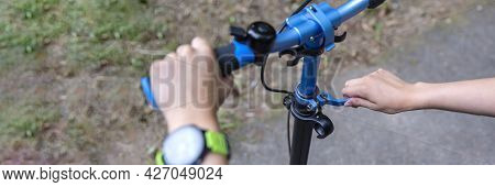 The Wheel Of A Scooter. Adjusting The Position Of The Scooter Steering Wheel. The Guy Adjusts The He