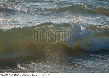 Colored Sea Waves With Splashes And White Breakers In Circeo Park, Sabaudia, Italy