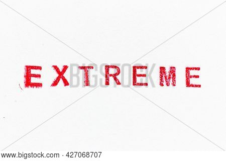 Red Color Ink Rubber Stamp In Word Extreme On White Paper Background